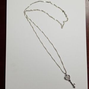 Sterling silver necklace w/ black & white diamonds